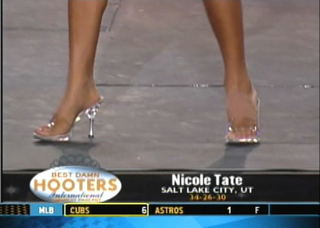 Illustration for article titled Real Boobs, Fake Boobs, & Crooked Boobs: The Hooters International Swimsuit Pageant